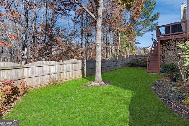 view of yard featuring a deck