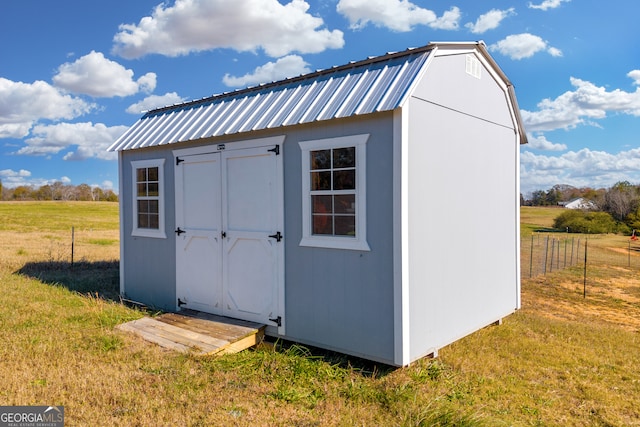 view of outdoor structure with a yard