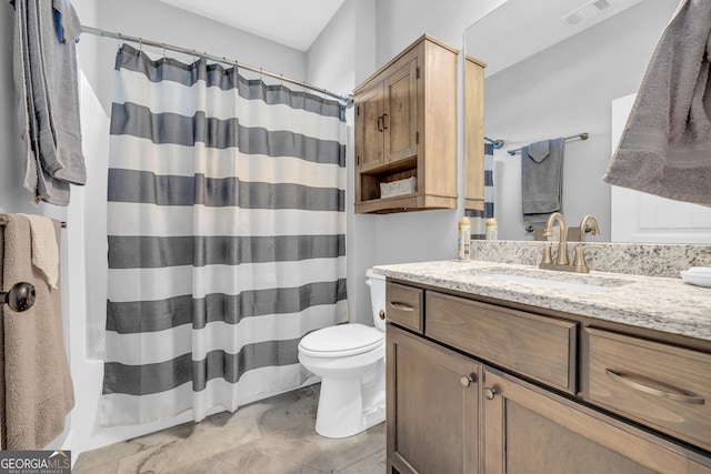 bathroom with a shower with curtain, vanity, and toilet