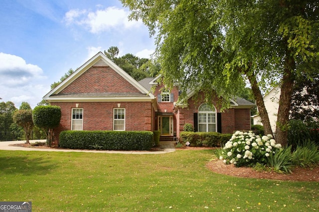 view of front facade featuring a front yard