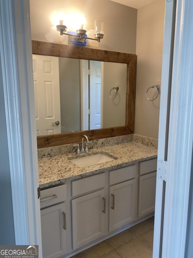 bathroom featuring vanity and tile patterned floors