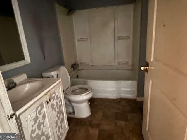 full bathroom with washtub / shower combination, vanity, and toilet