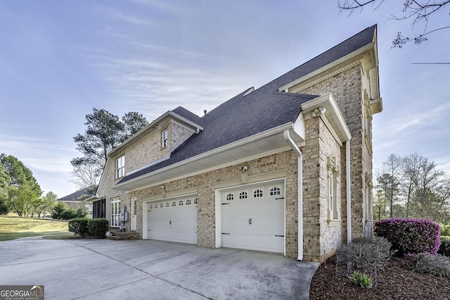 view of home's exterior with a garage