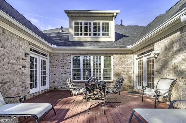 wooden terrace featuring french doors