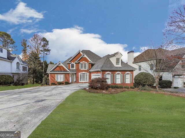 view of front facade with a front lawn