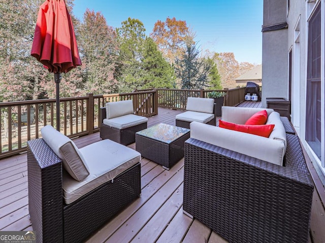 wooden deck featuring an outdoor living space