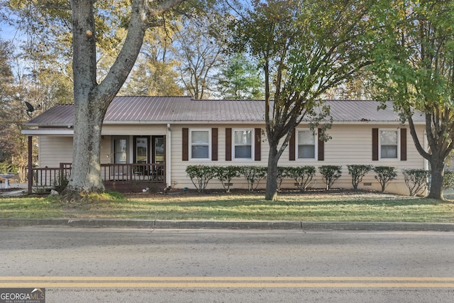 single story home with a front lawn