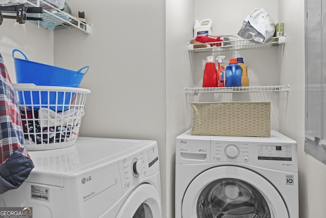 laundry area with independent washer and dryer