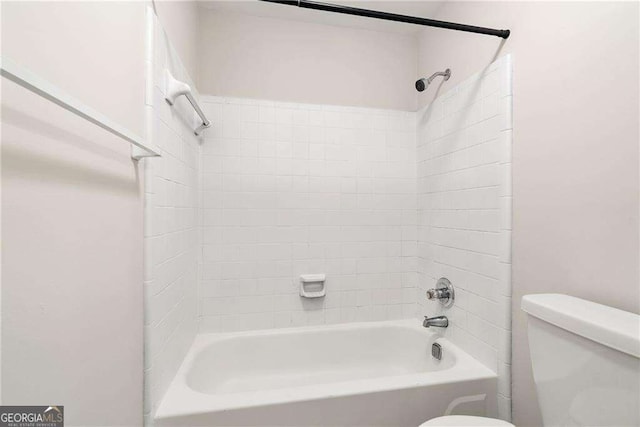 full bathroom with tub / shower combination and toilet