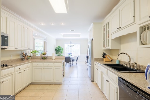 3798 Bermuda Run Dr, Valdosta, GA 31605 - kitchen featuring stainless steel appliances, glass insert cabinets, light tile patterned floors, light countertops, and recessed lighting