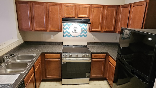 kitchen featuring black fridge, stainless steel electric stove, and sink