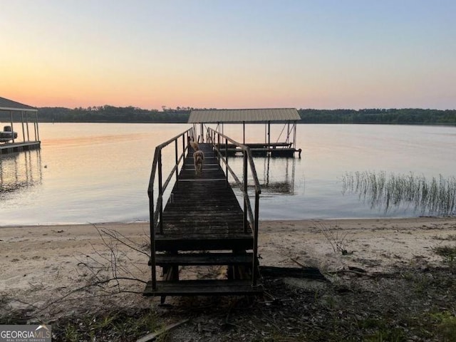 dock area featuring a water view