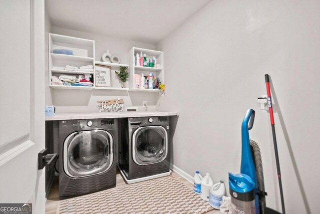 laundry area featuring independent washer and dryer