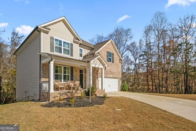 craftsman house with brick siding, a porch, a garage, and concrete driveway