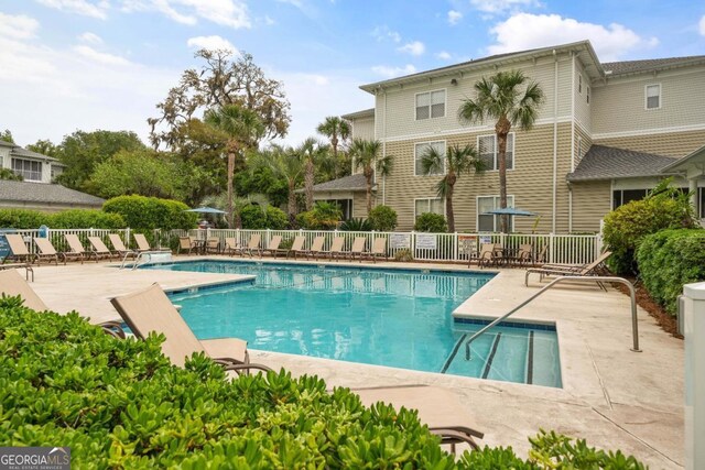 view of swimming pool featuring a patio