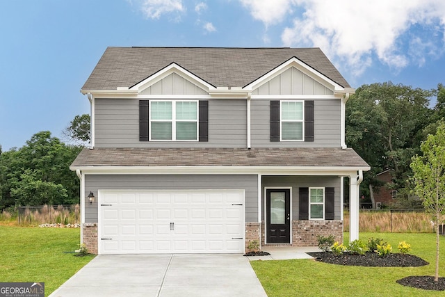 craftsman inspired home with a garage and a front lawn