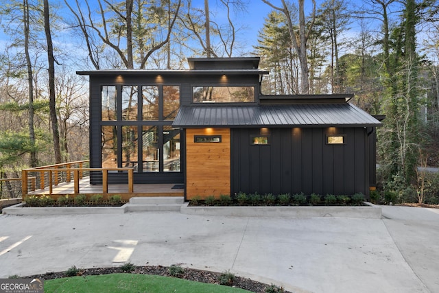 73 Cannon St, Clayton, GA 30525 - view of front of home featuring board and batten siding and metal roof