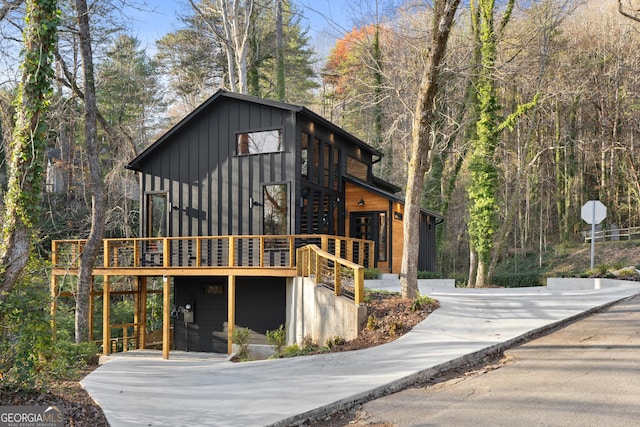 view of front of home with a wooden deck