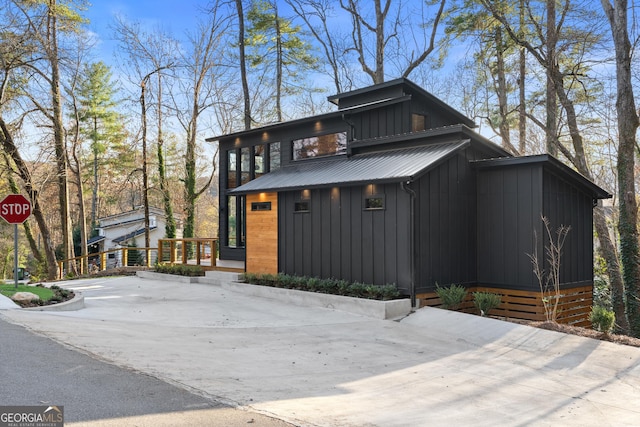 73 Cannon St, Clayton, GA 30525 - contemporary home with board and batten siding and metal roof