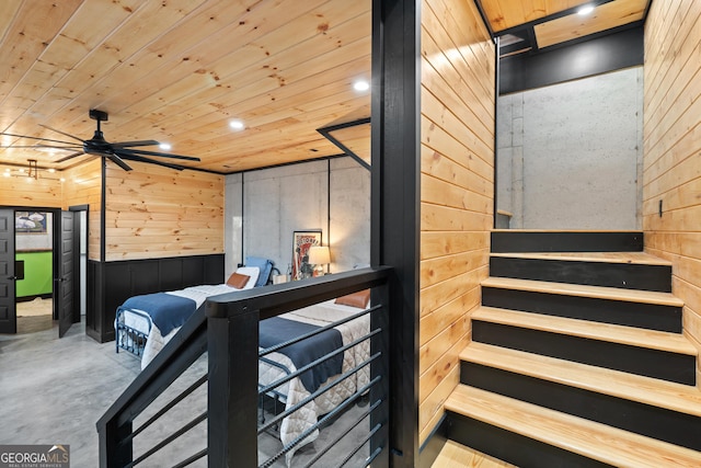 73 Cannon St, Clayton, GA 30525 - staircase with wooden walls, concrete flooring, ceiling fan, recessed lighting, and wood ceiling