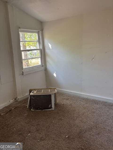 161 Cotton St, Commerce, GA 30529 - unfurnished room featuring carpet floors and lofted ceiling