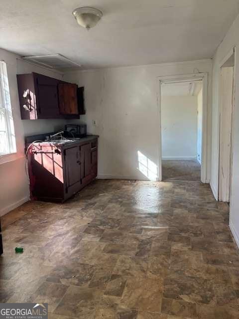 161 Cotton St, Commerce, GA 30529 - kitchen with dark brown cabinets