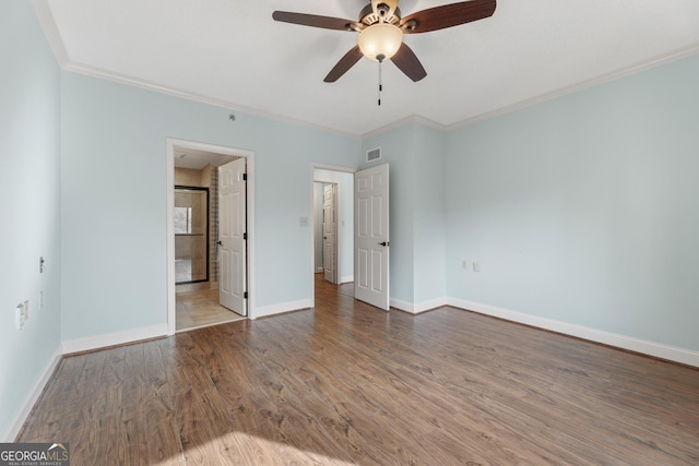 unfurnished bedroom featuring hardwood / wood-style flooring, ceiling fan, and crown molding