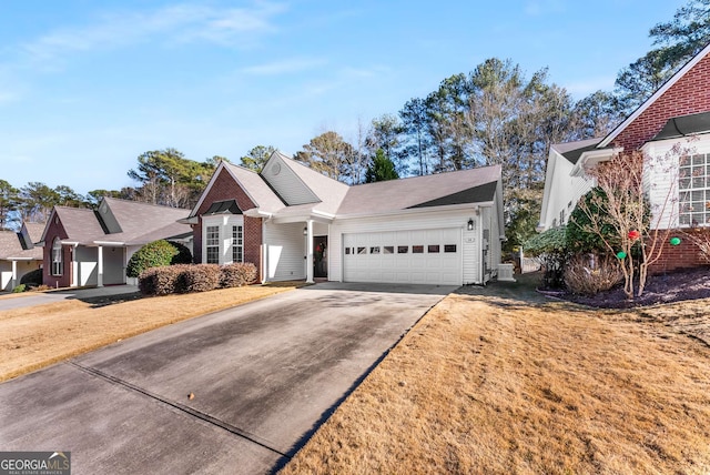 front of property featuring a garage and a front lawn