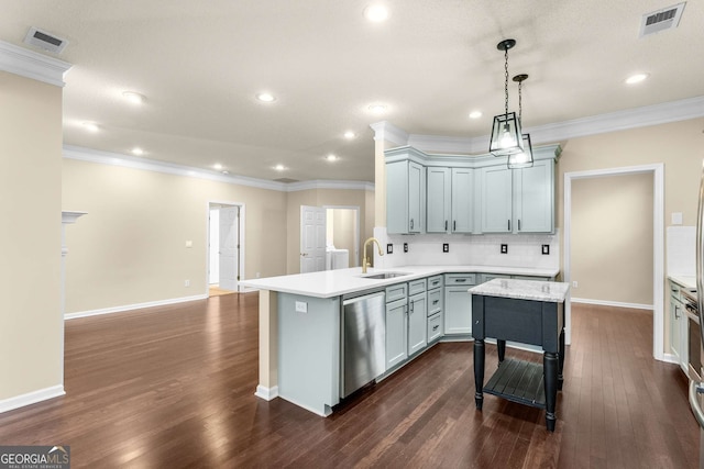 kitchen with dishwasher, sink, tasteful backsplash, dark hardwood / wood-style flooring, and kitchen peninsula