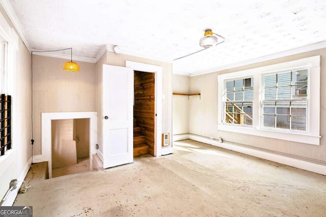 spare room featuring ornamental molding