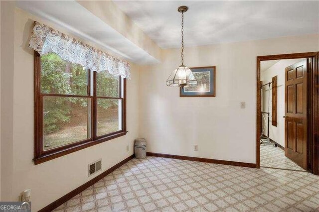 view of unfurnished dining area