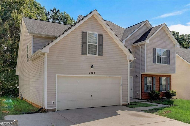 view of front of home with a garage