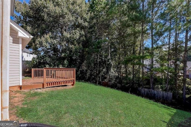 view of yard featuring a deck