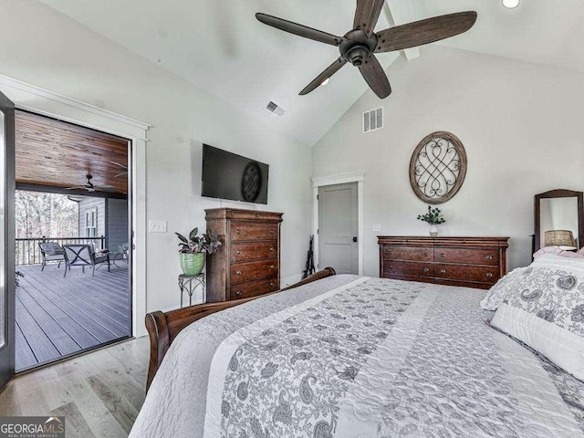 bedroom featuring light hardwood / wood-style floors, high vaulted ceiling, and ceiling fan