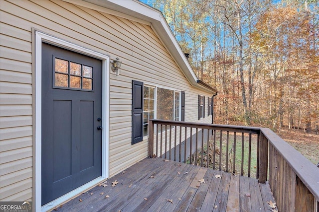 doorway to property featuring a deck