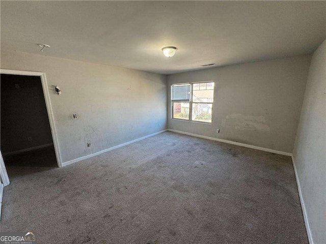 spare room with carpet flooring