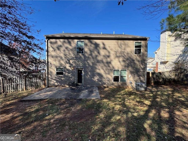 rear view of property featuring a patio