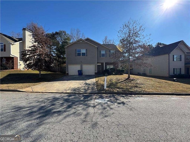 front of property with a garage