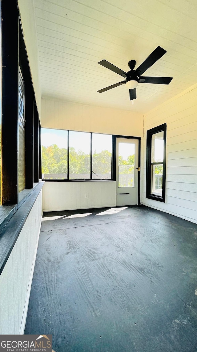 back of house with a sunroom and central air condition unit