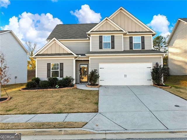 craftsman house featuring a garage and a front lawn