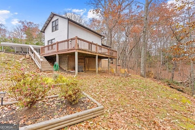 rear view of property with a deck