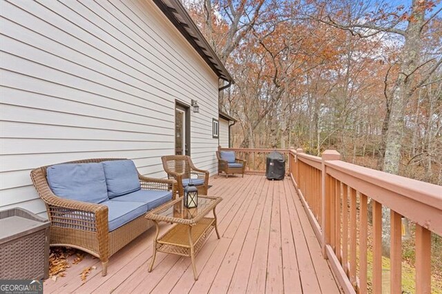 deck featuring an outdoor living space