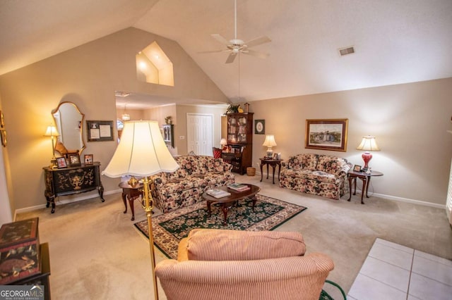 living room with ceiling fan, light carpet, and high vaulted ceiling