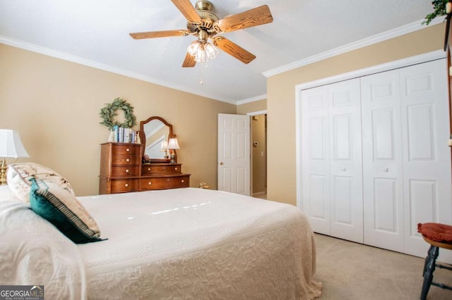 bedroom with a closet, light colored carpet, ceiling fan, and ornamental molding