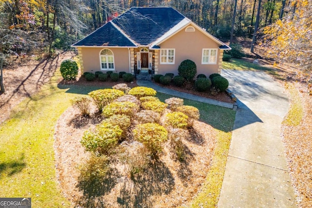 view of front of home with a front yard