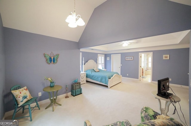 carpeted bedroom with a chandelier, lofted ceiling, connected bathroom, and multiple windows