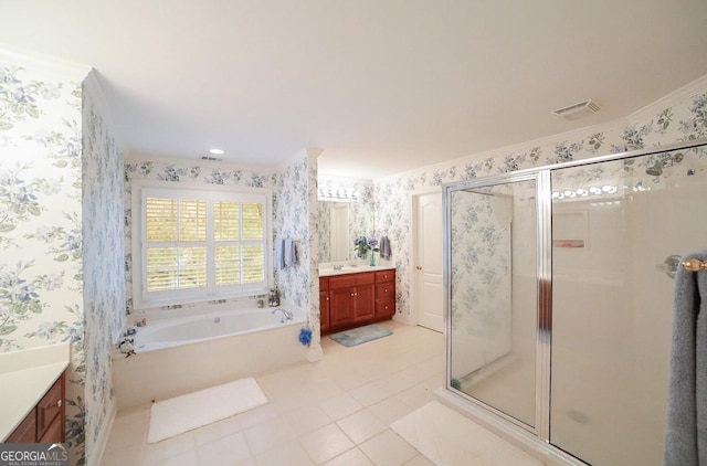 bathroom with tile patterned flooring, vanity, ornamental molding, and plus walk in shower