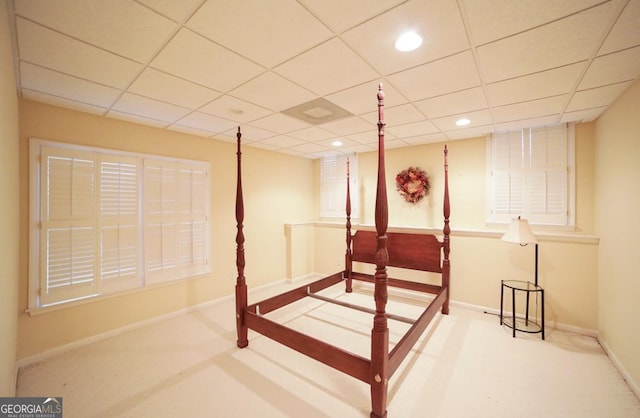 bedroom featuring a paneled ceiling