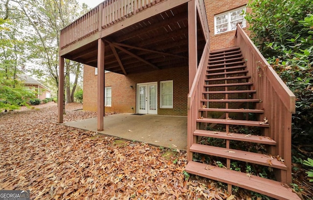 exterior space featuring french doors and a deck