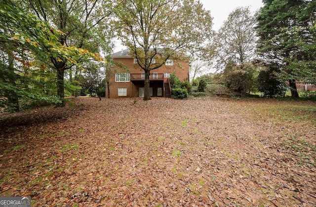 view of yard with a deck